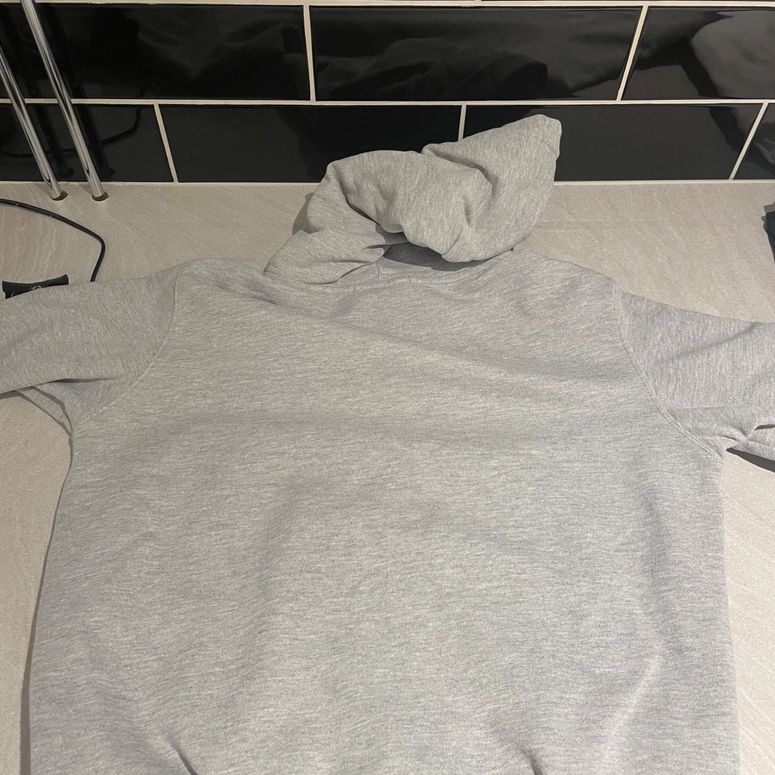 Grå hoodie från Stone Island - 1