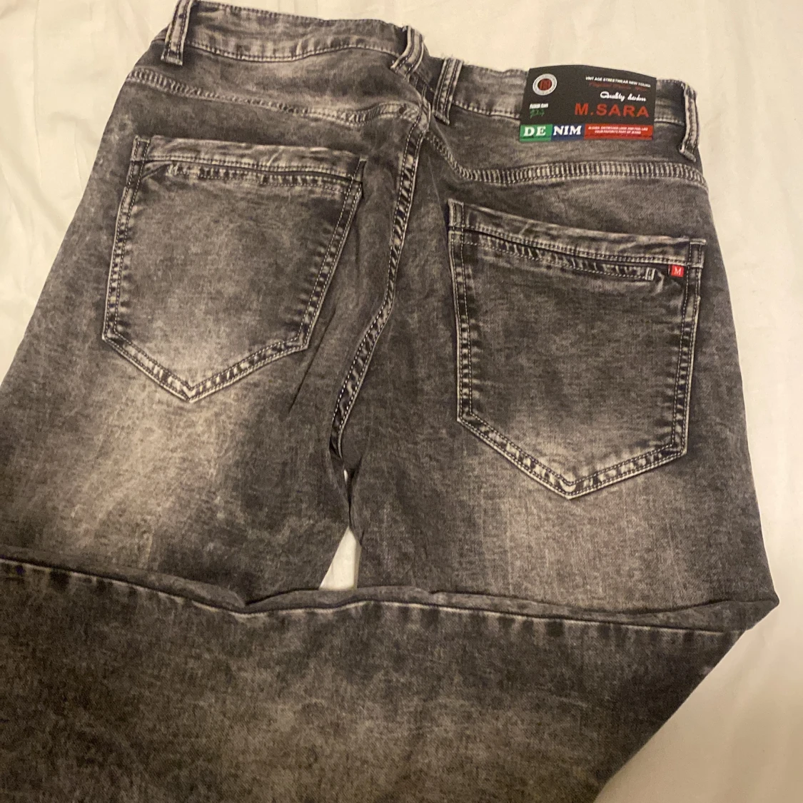 Grå tvättade jeans från M.Sara, strl 32 - 1