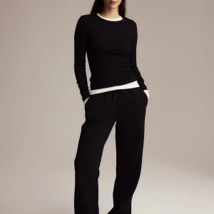 Svarta mjukisbyxor från Gina Tricot - Svarta mjukisbyxor från Gina Tricot med elastisk midja och snörning framtill. 💞💞