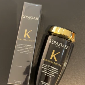 Kérastase Chronologiste hårvård - OANVÄNDA, Lyxigt hårvårdskit från Kérastase Chronologiste med svart och guld design. Innehåller Thermique Régénérant och Bain Régénérant, båda med hyaluronsyra och abyssine för återfuktning och glans. Perfekt för dig som vill ha exklusiv hårvård med elegant förpackning.