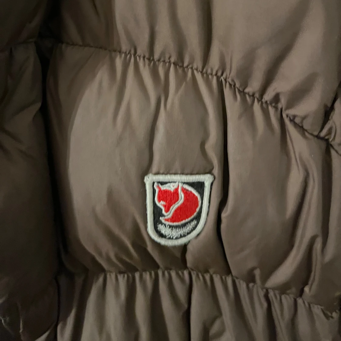 Brun pufferjacka från Fjällräven M - 2