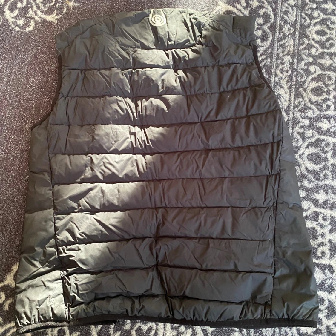 Svart dunväst från Sail Racing - 2