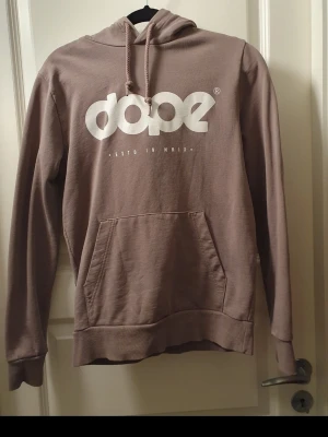 Dope Hoodie - Snygg helt ny beige/ gammelrosa aktig Dope hoodie i strl 38🌸