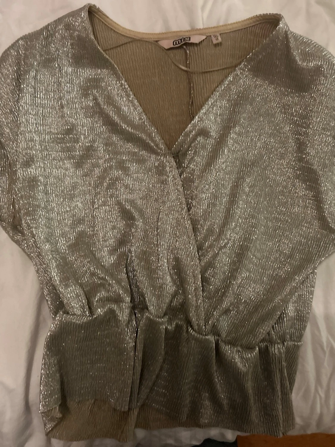 Glittrig omlottopp i silver - 2