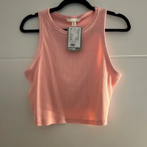 Kort topp - En fin kort topp som aldrig används. 