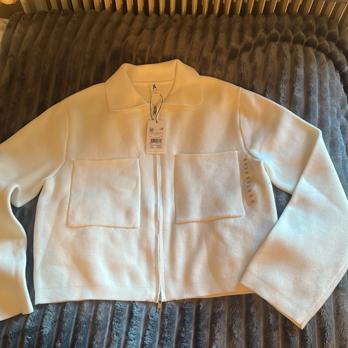 Vit stickad overshirt från Åhléns