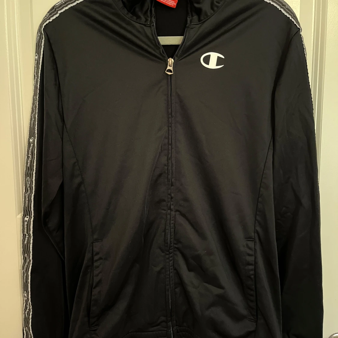 Svart vindjacka från Champion
