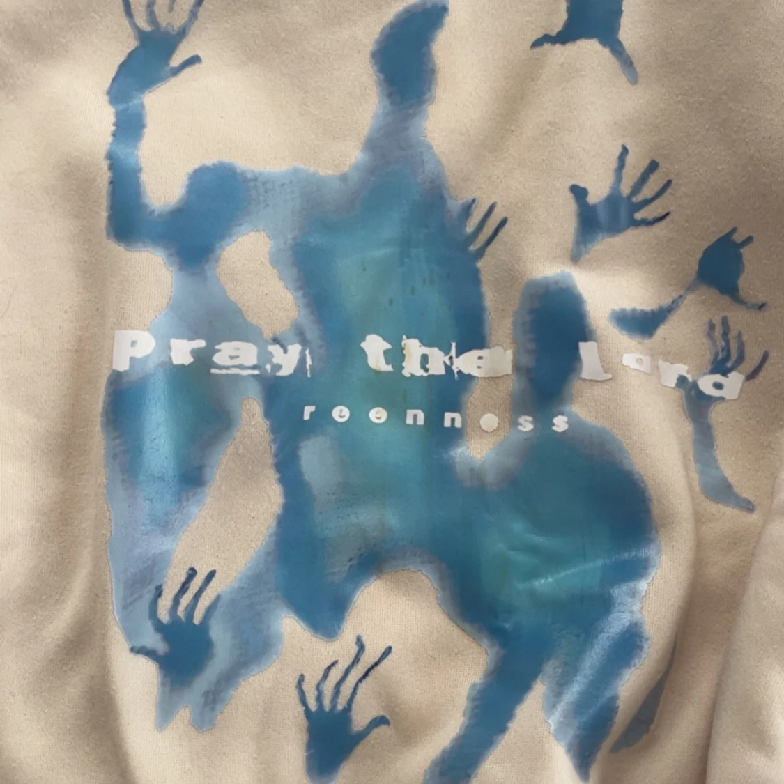 Beige hoodie med blått tryck - 1