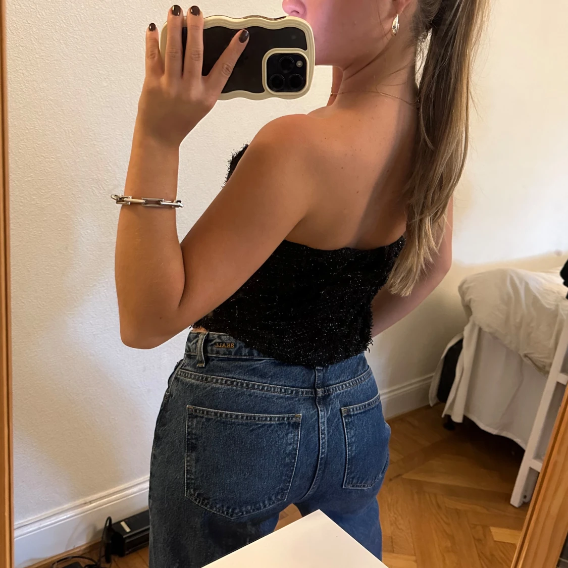 Svart glittrig tubtopp i bouclé - 2