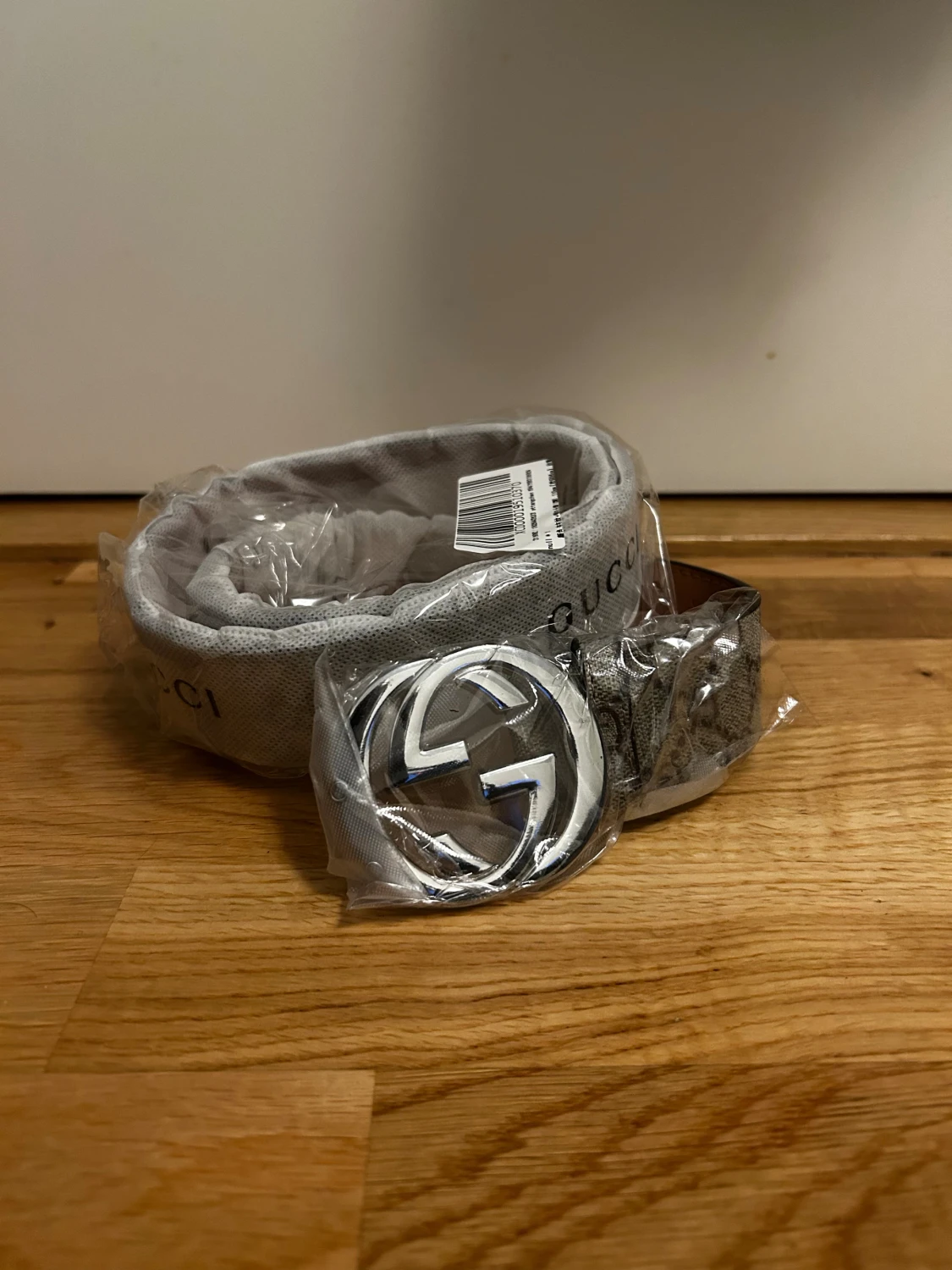 Beige bälte med silver spänne