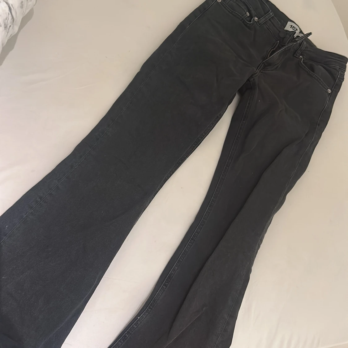 Svarta bootcut jeans från 157 - 1