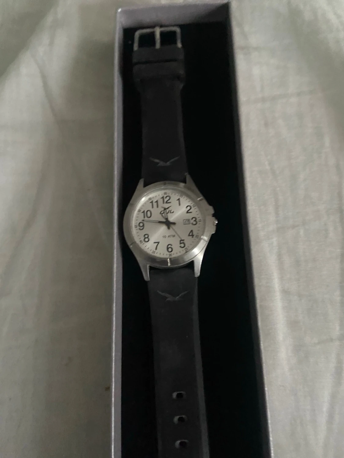 Silverfärgad analog klocka från Q&Q