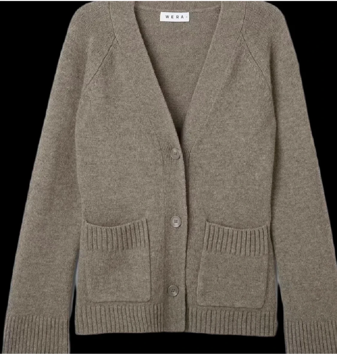 Beige kofta från Wera med fickor