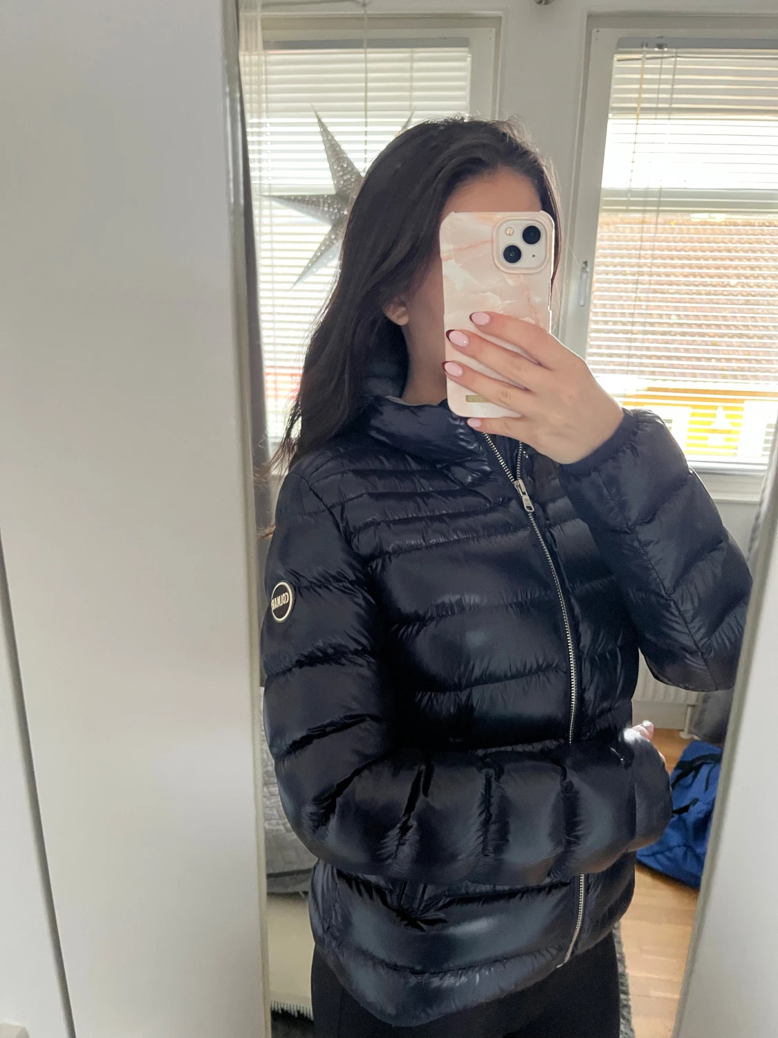 Mörkblå Colmar dunjacka strl 40