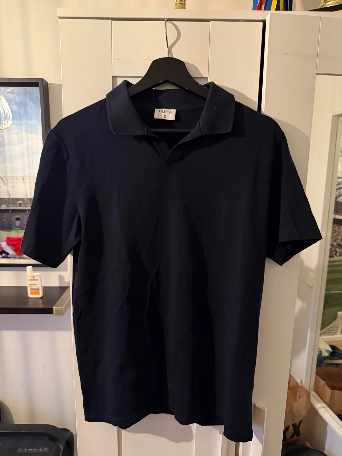 Mörkblå pikétröja från Filippa K