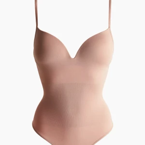 Body från HM  - Body från hm. Lappar kvar!