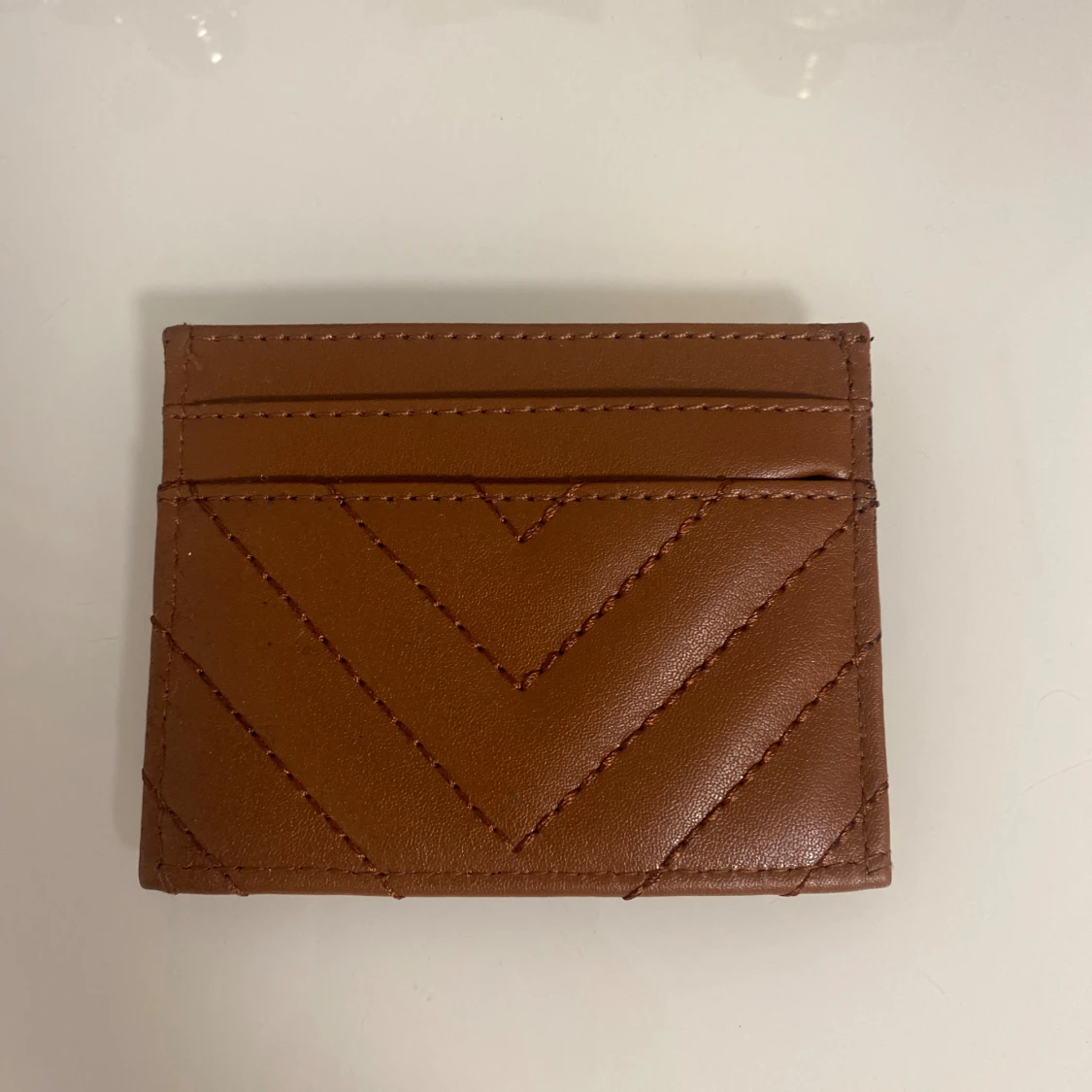 Brun quiltad plånbok från YSL - 1