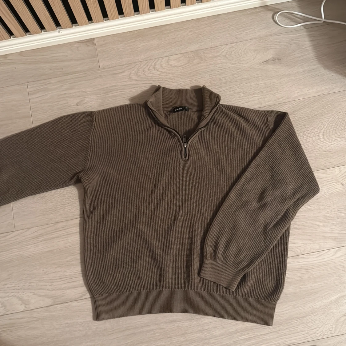 Brun stickad half zip tröja 