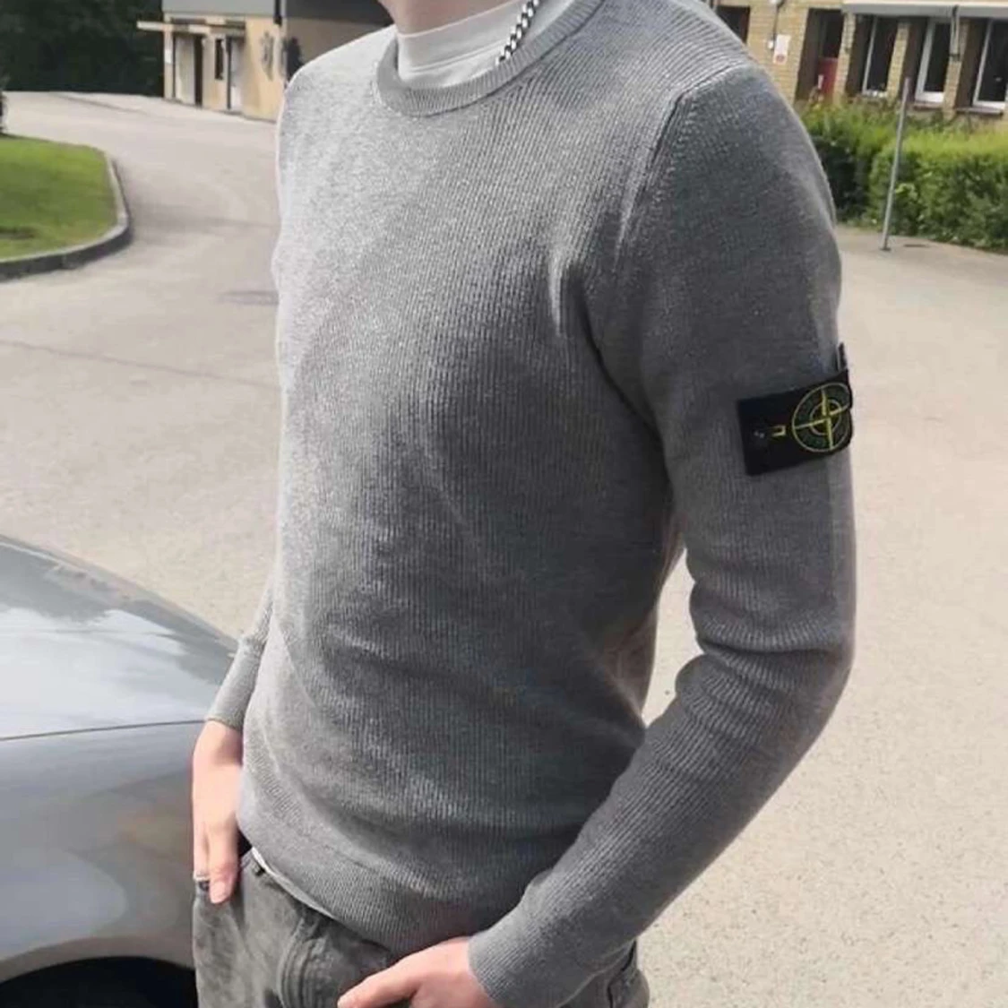 Grå stickad tröja från Stone Island