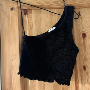 Kort inte shoulder - Våfflad i materialet, använd nån enstaka gång