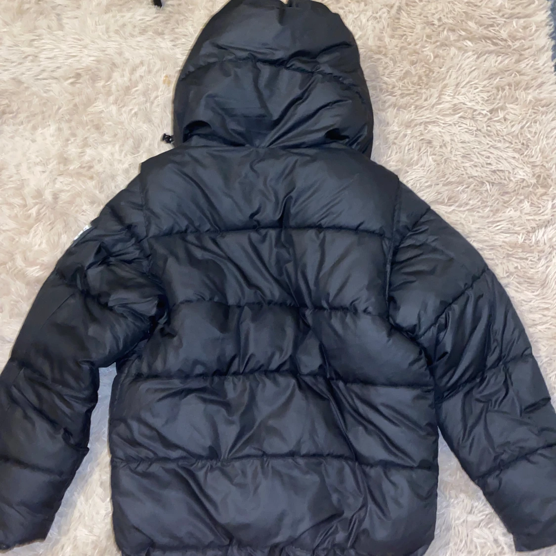 Svart dunjacka från Burberry - 90