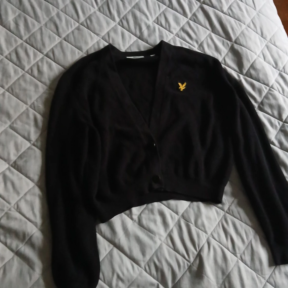 Svart kofta från Lyle & Scott
