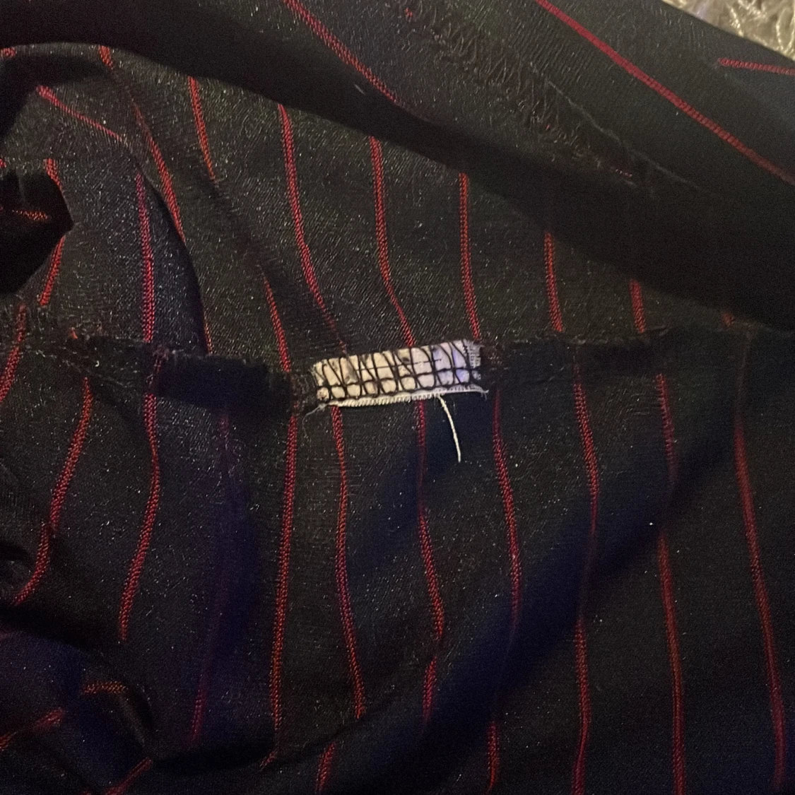 Svart och röd randig pikétröja från Yves Saint Laurent - 93