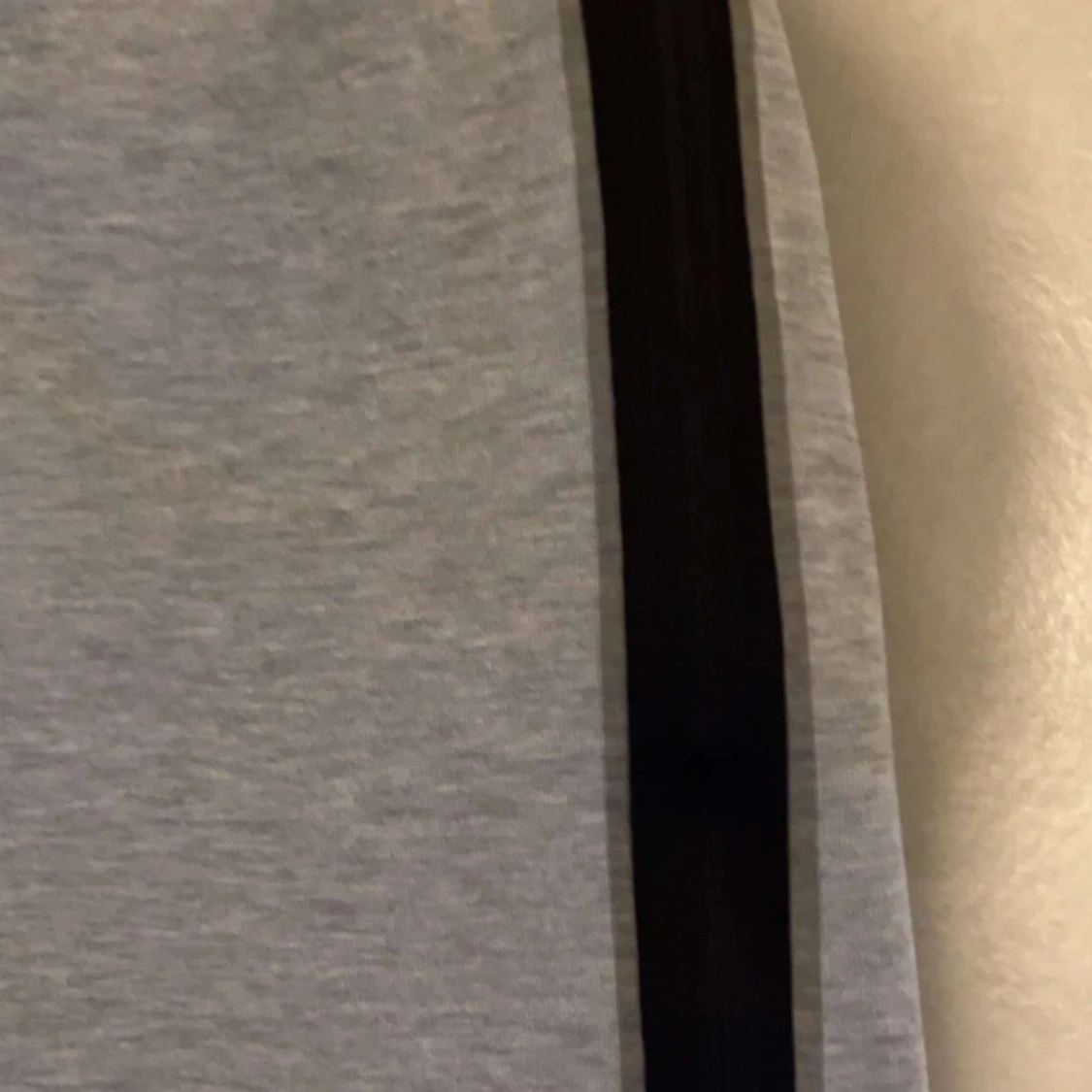 Grå mjukisbyxor från Nike tech - 91