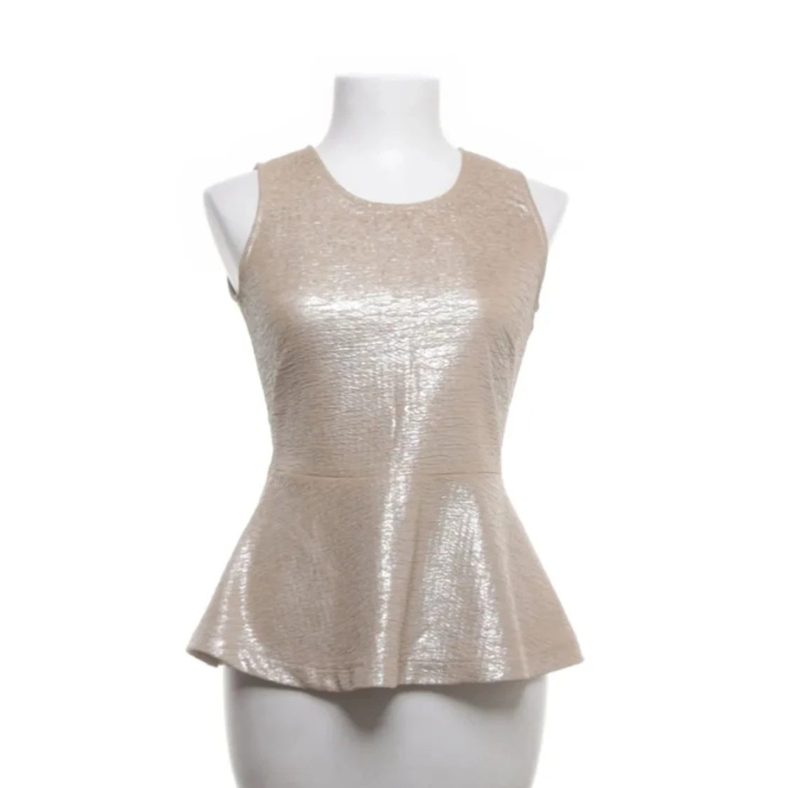 Glittrig beige topp från Lindex