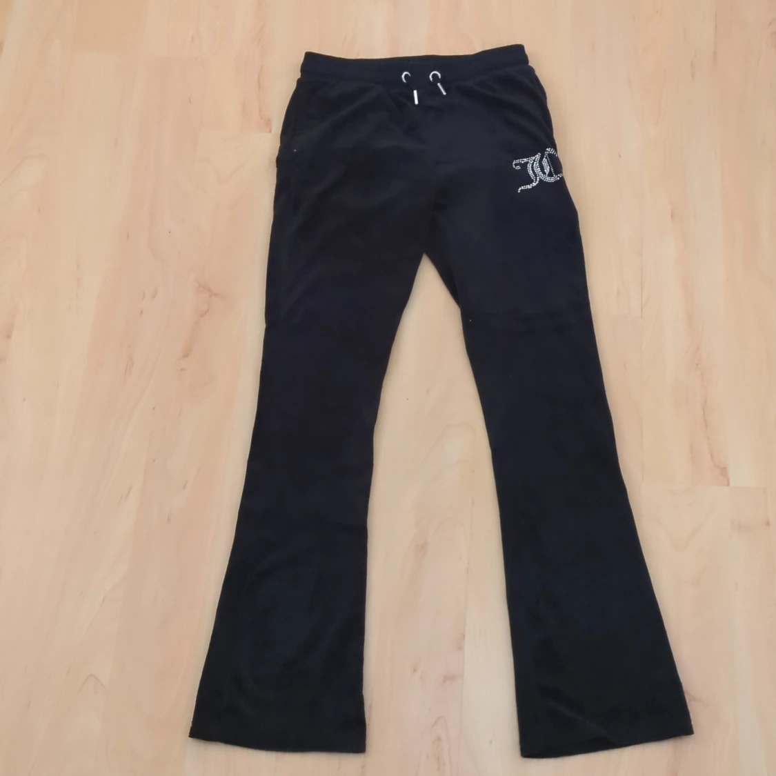 Svarta Juicy Couture