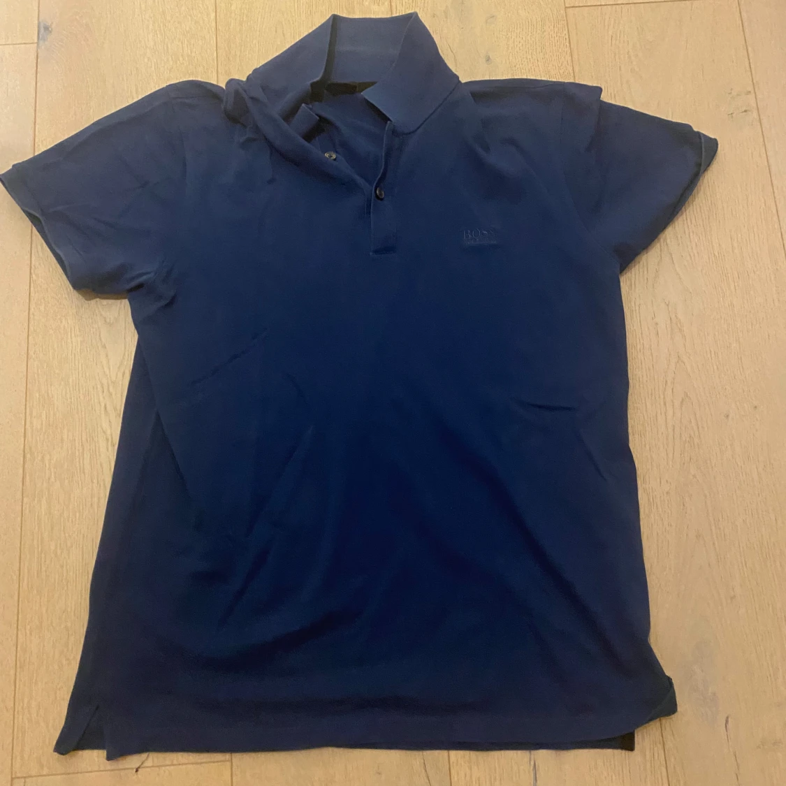 Blå pikétröja från Hugo Boss - 91