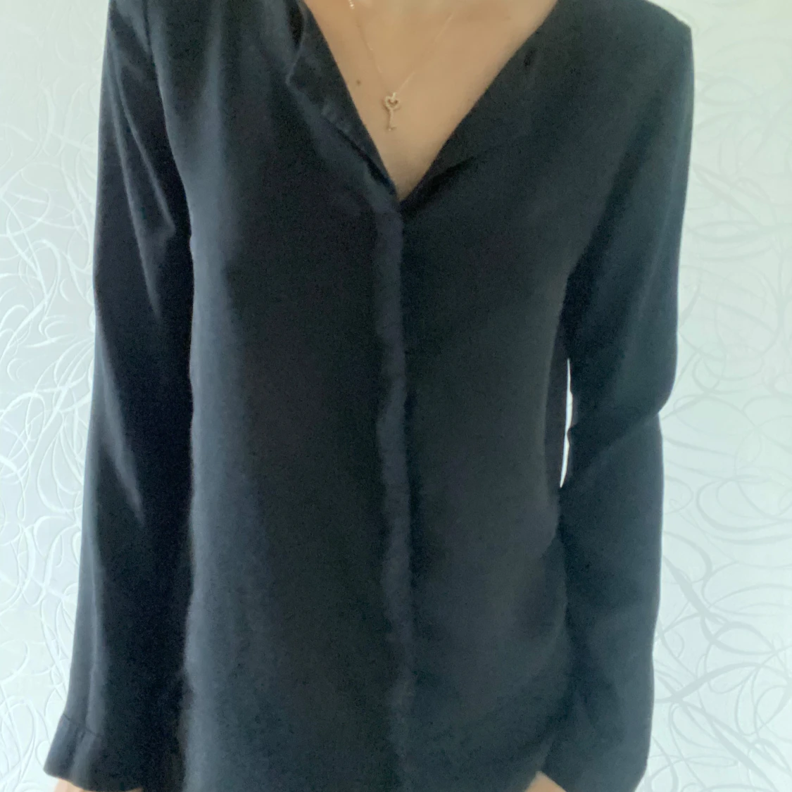 Svart långärmad blus