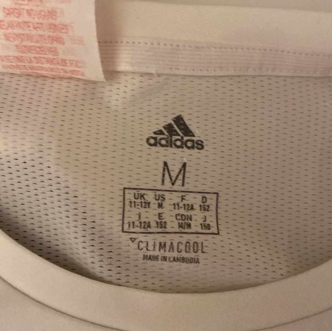 Vit t-shirt från Adidas - 90