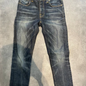 Nudie jeans  - Feta nudie jeans med modell grim Tim. Size 29/32 dom är i bra skick. Hör av er vid funderingar! 