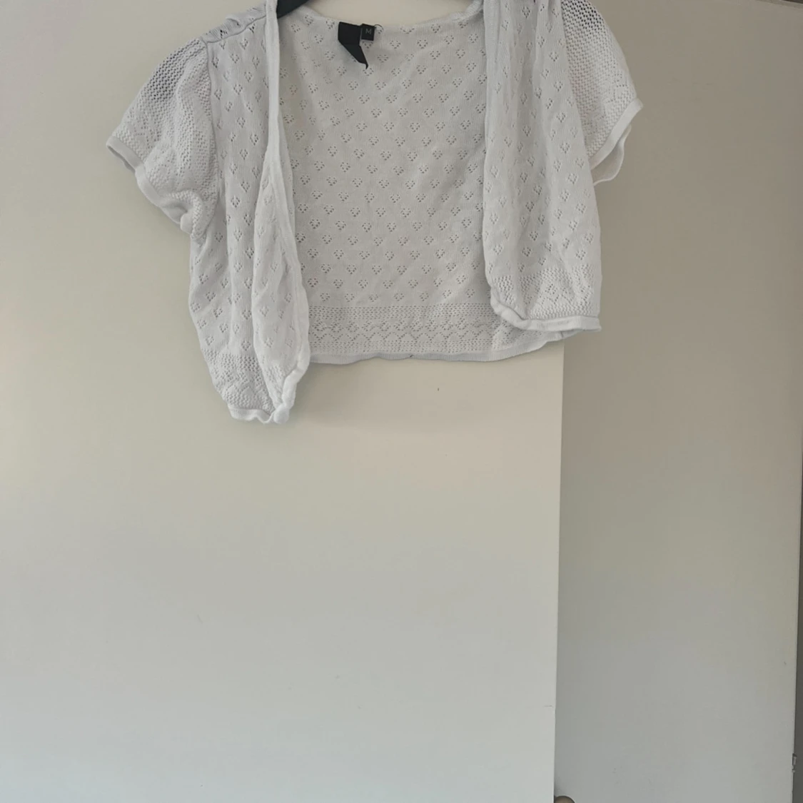 Vit kortärmad bolerotopp