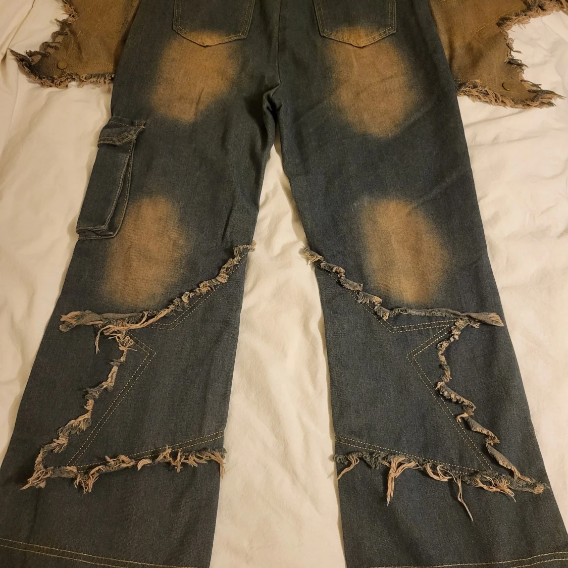 Unika slitna jeans med fransar - 91