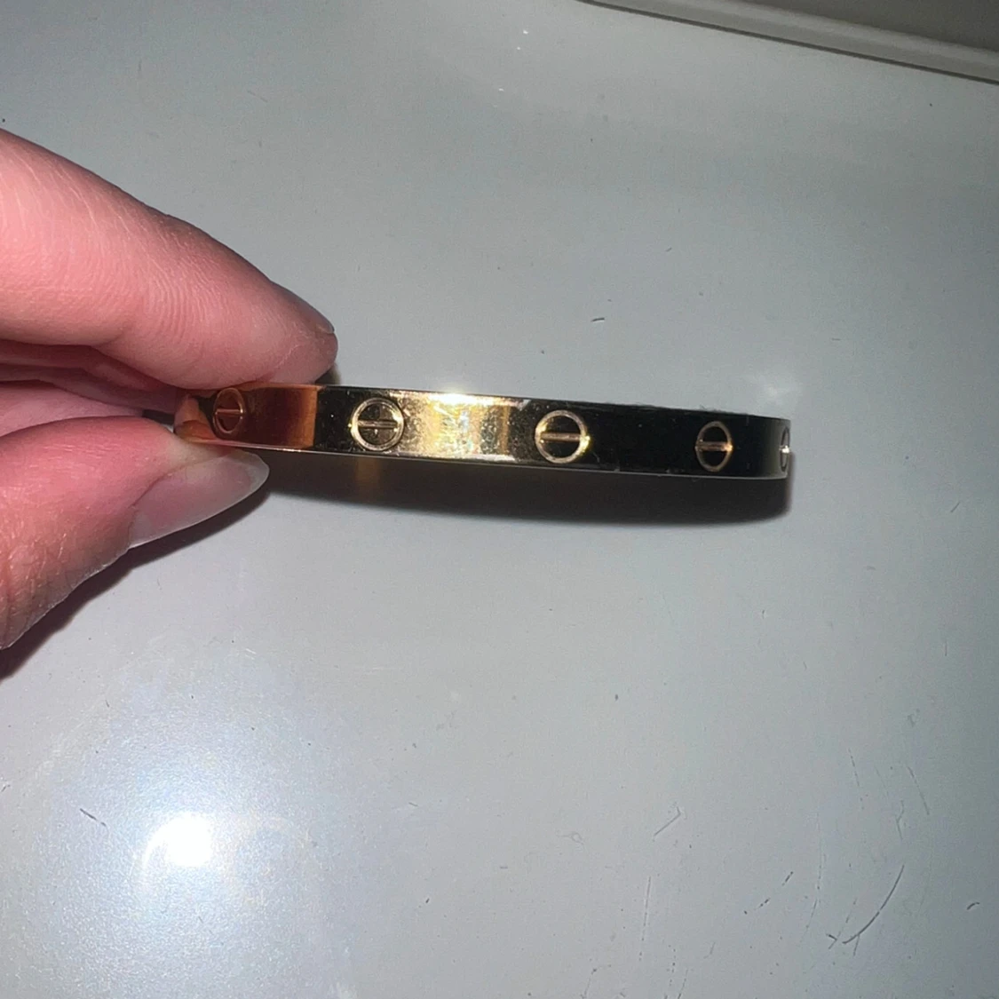 Guldarmband med skruvdetaljer - 91