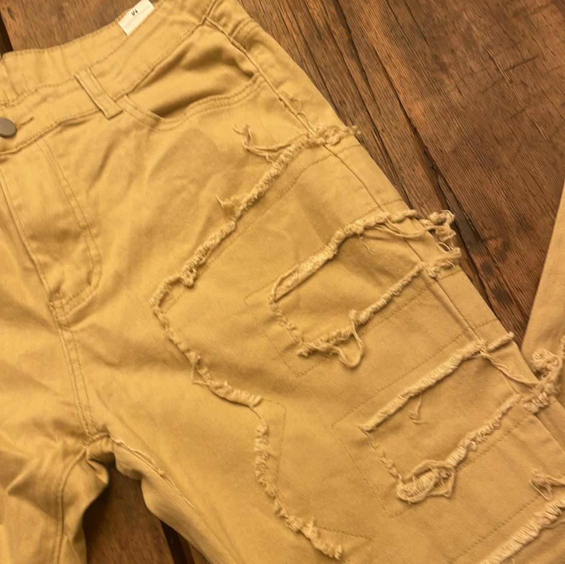 Beige slitna byxor - 92