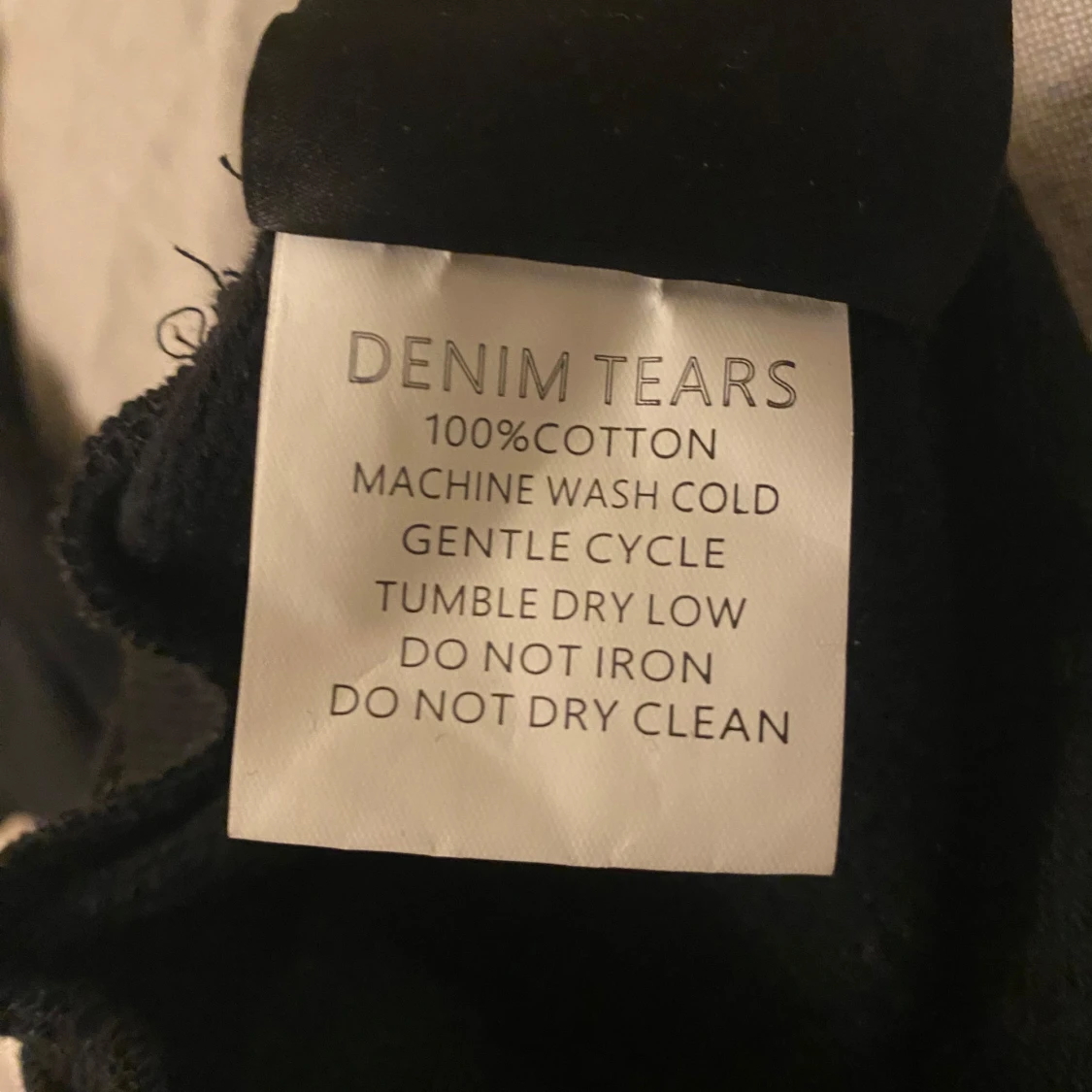 Svart hoodie med blommönster från Denim Tears - 93