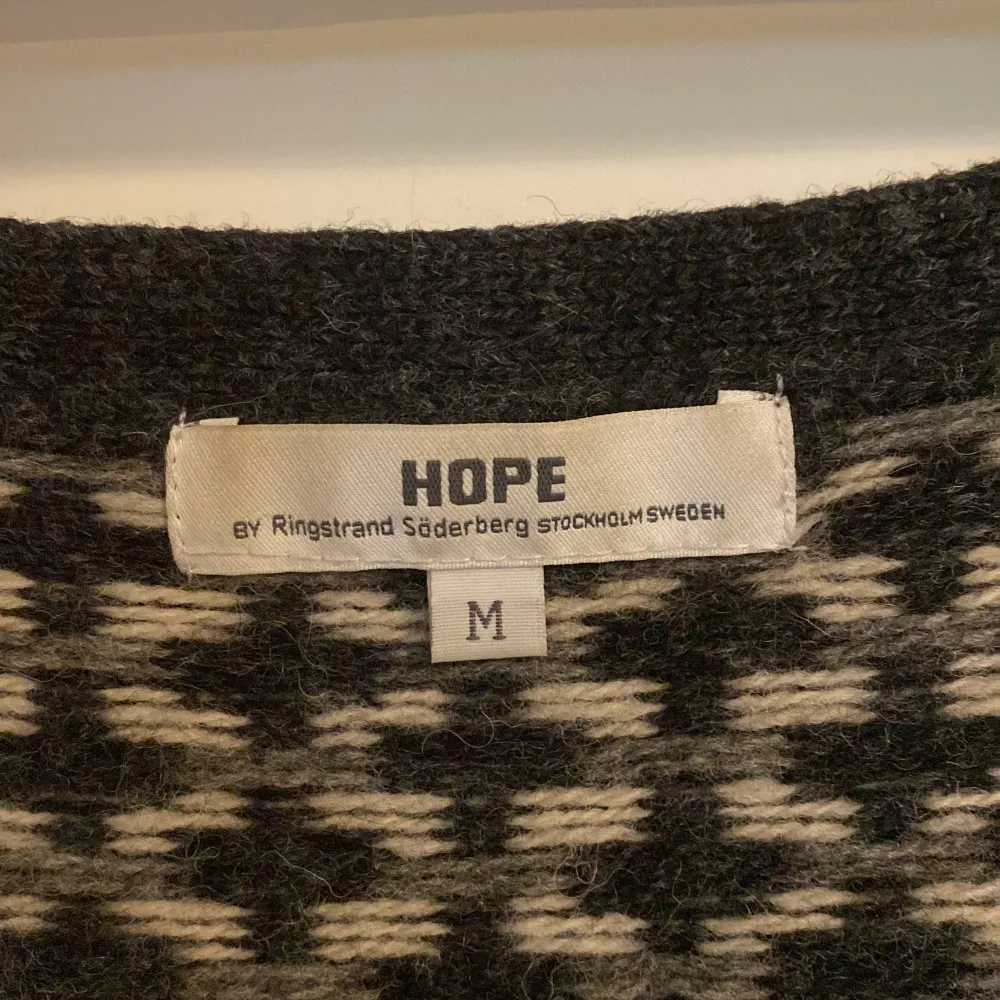 Hope black, white, and grey soft wool, Hope cardigan in excellent condition. Labeled size M, but would likely work best as an oversized fit for a size S.. Tröjor & Koftor.