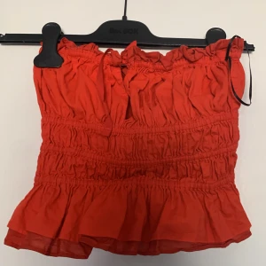 Röd tubtopp - Använd fåtal gånger 