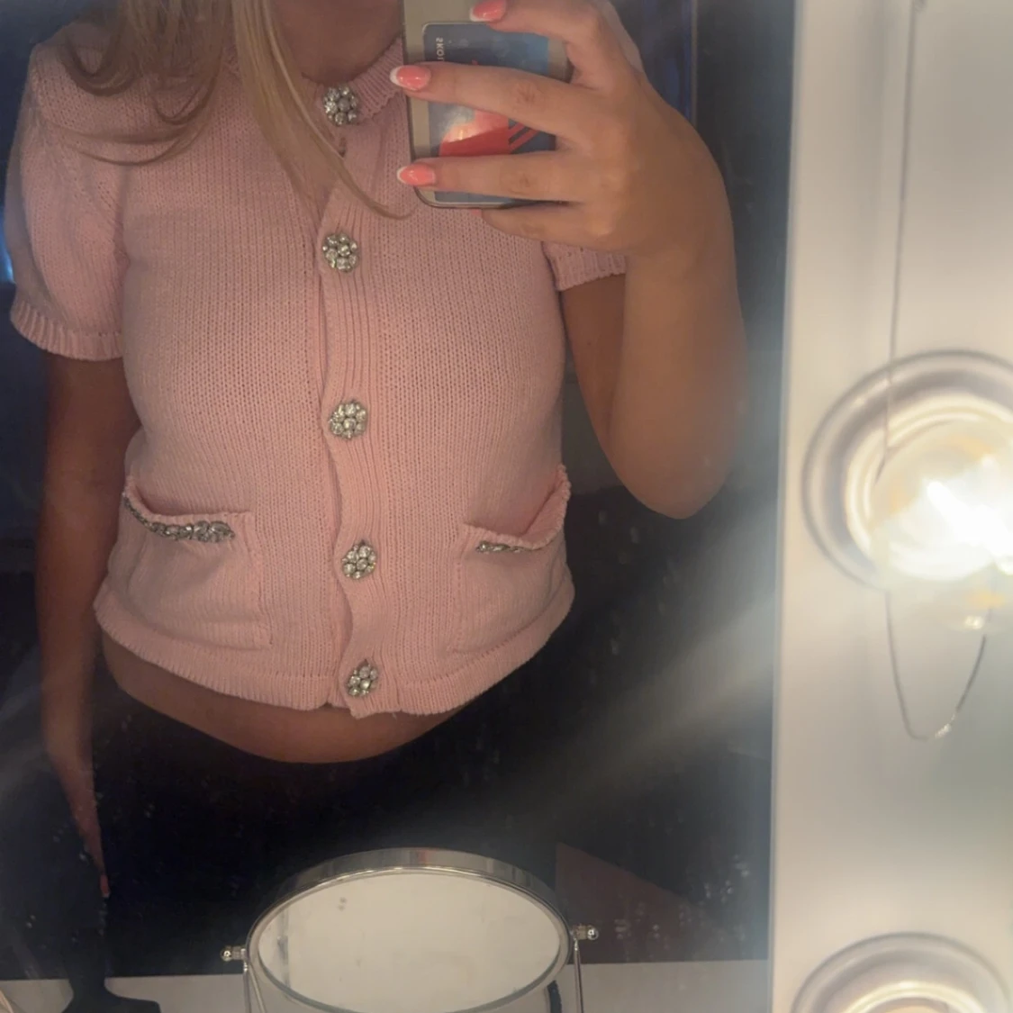 Rosa t-shirt med silver detaljer 