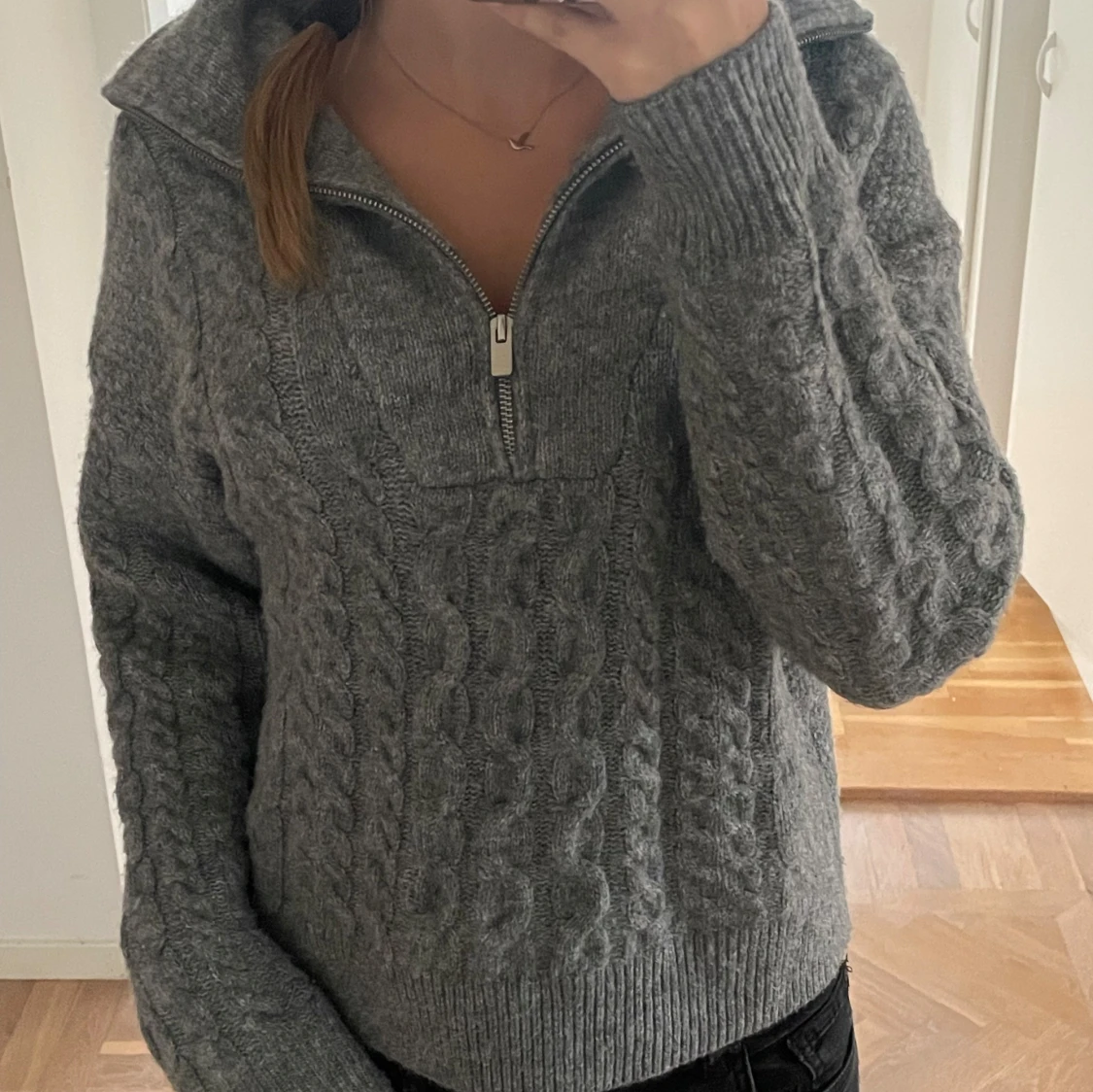 Stickad half zip tröja