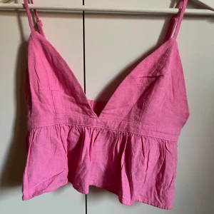 Rosa topp - En jättefin rosa topp som aldrig använts. Nyskick!