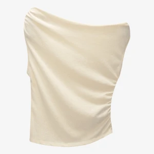 Beige ärmlös topp - Säljer en stilren beige ärmlös topp med draperad design. Perfekt för en elegant och avslappnad look. Toppen har en mjuk och bekväm passform. Lite genomskinlig.