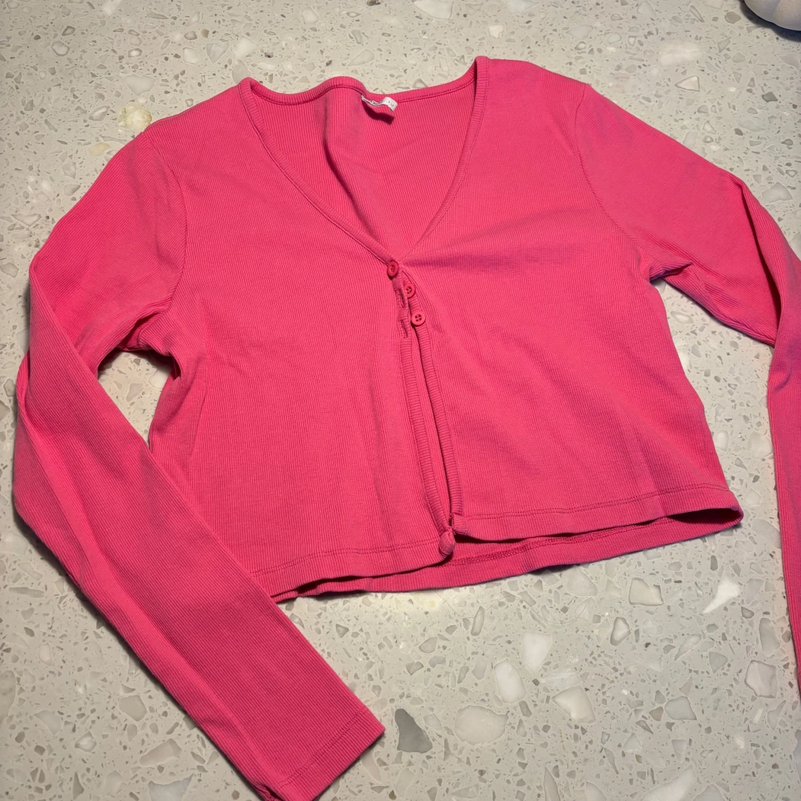 Rosa ribbad kofta från ONLY