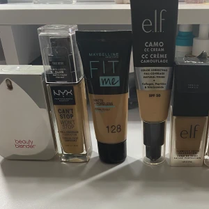 Olika foundations från milani/elf/nyx/beautyblender/maybelline - Samling av olika foundations och en beautyblender. Inkluderar NYX Can't Stop Won't Stop, Maybelline Fit Me Matte Poreless, e.l.f. Camo CC Cream och Flawless Satin Foundation, samt Milani Screen Queen. Vissa är testade 1-2 gånger. 200kr för 7st foundations. 