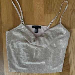 Linne guld - Gulligt kort linne med tunna band. 