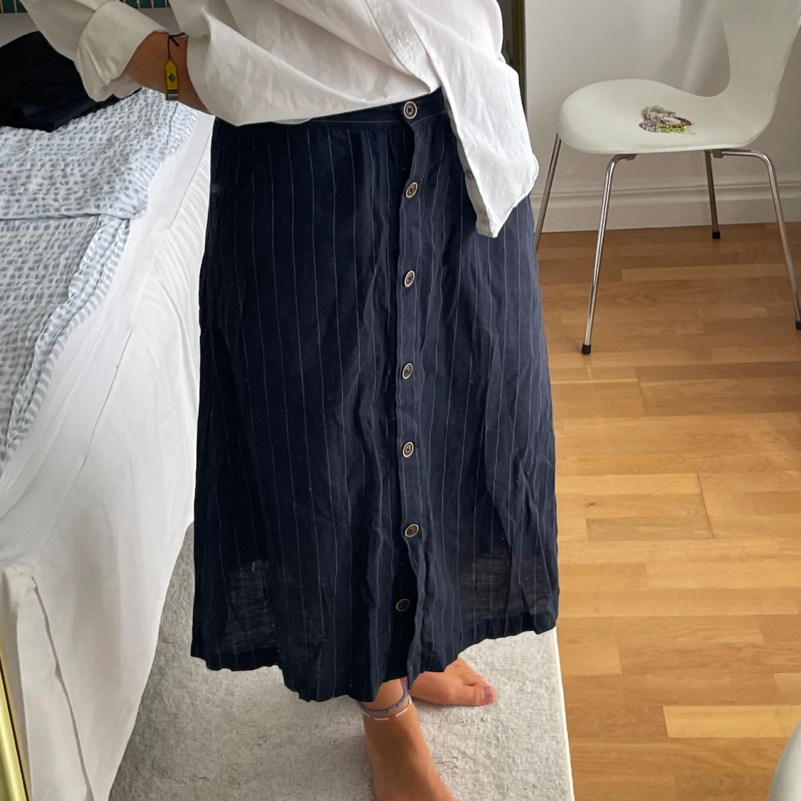 Mörkblå kjol med knappar - 90