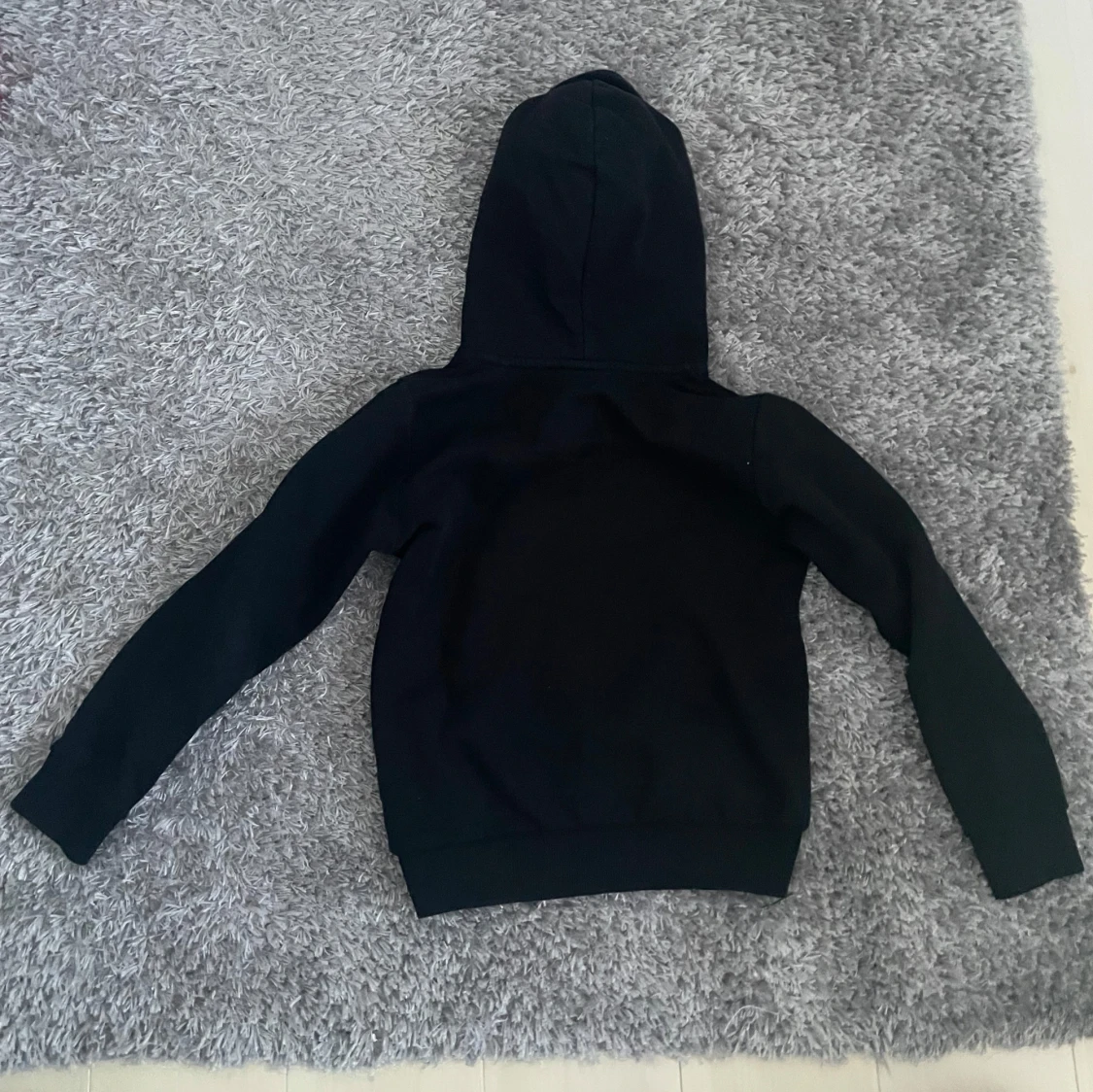 Svart hoodie från Peak Performance - 90